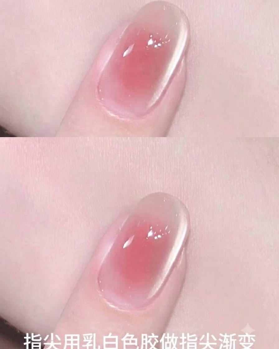 Eine Nahaufnahme, die milchiges Gel zeigt, das auf die Spitze eines Fingernagels aufgetragen wurde, um einen sanften Farbverlauf zu bilden.