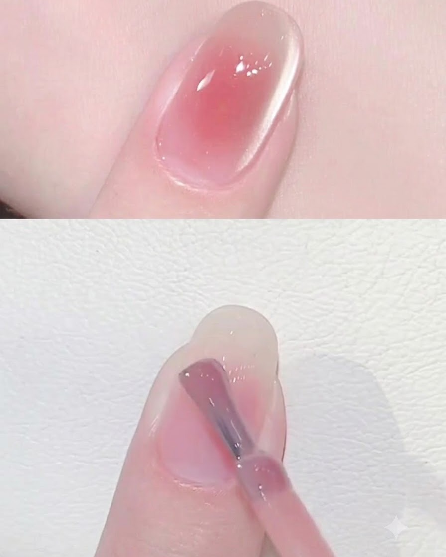 Ein Nagelpinsel glättet und verblendet den milchweißen Farbverlaufsübergang auf der Nageloberfläche.