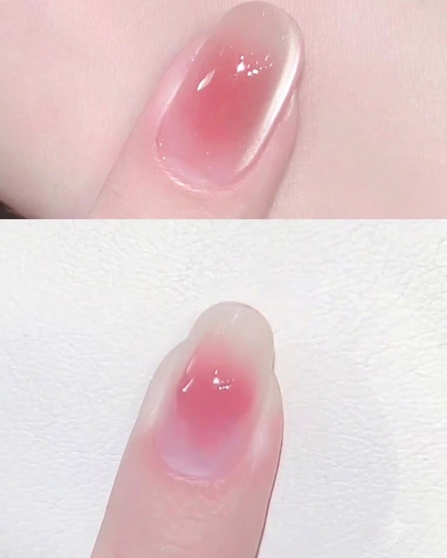 Ein kleiner Magnet schwebt in der Nähe eines Fingernagels, der mit nassem Cat Eye Gel überzogen ist, um die magnetischen Partikel zu verteilen.